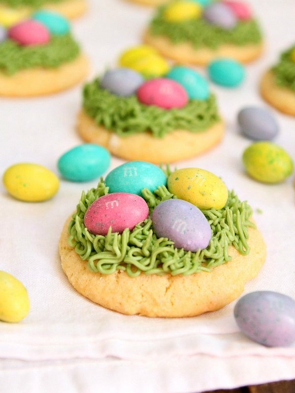 easter grass sugar cookies with chocolate eggs on top