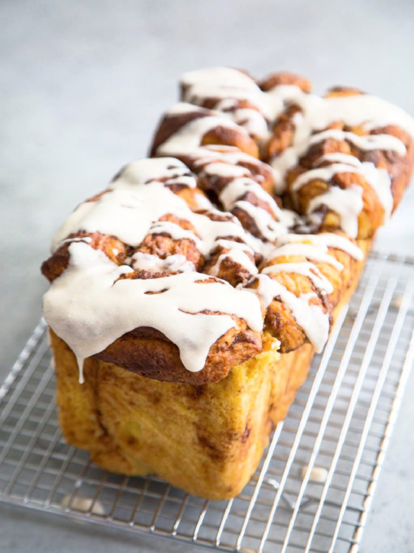 loaf of pumpkin pull apart bread on cooling rack