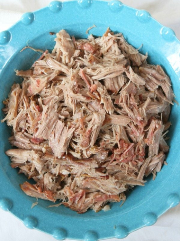 pulled kalua pork in a blue bowl