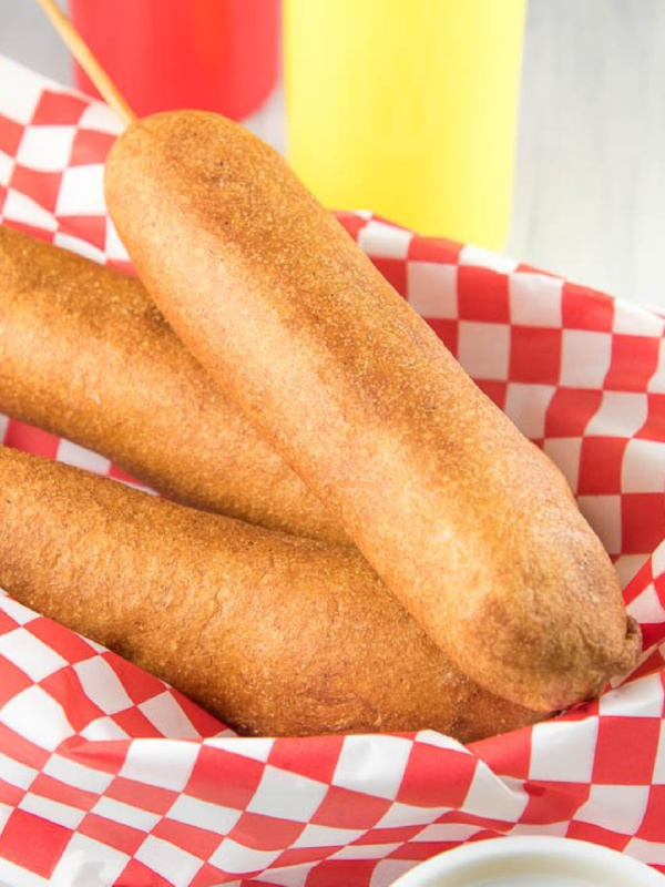 homemade corn dogs in a basket