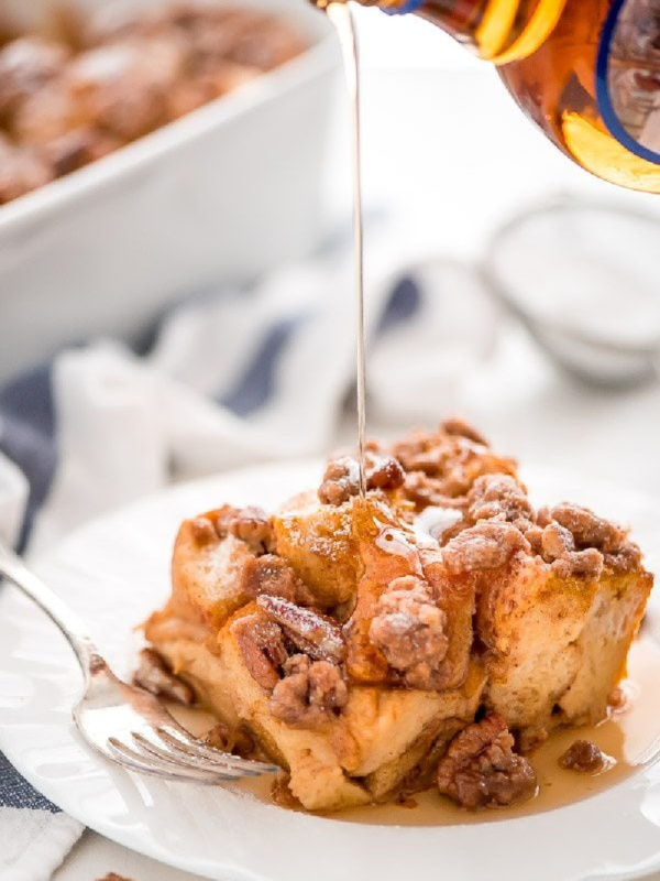 slice of pumpkin french toast casserole with syrup