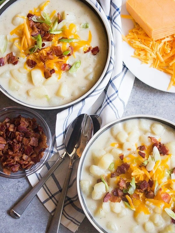 two bowls of loaded potato soup