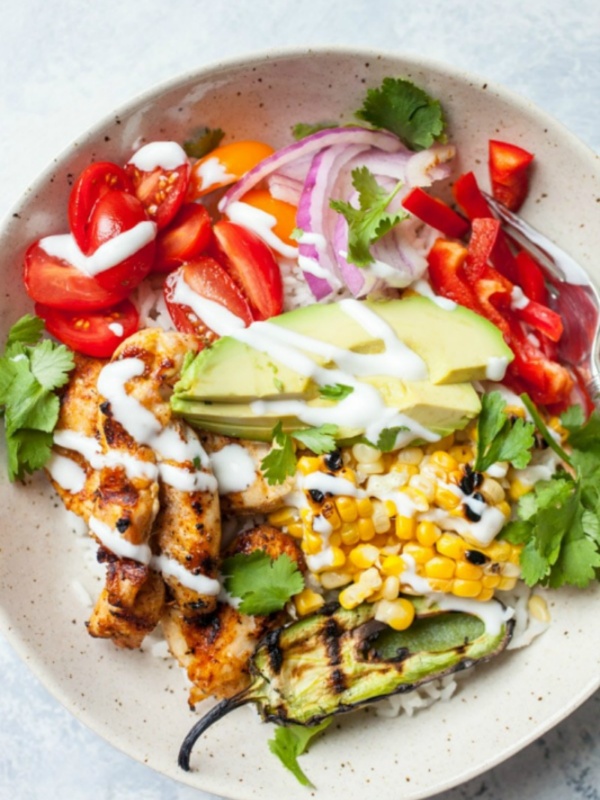 Overhead shot of Grilled Chicken Burrito Bowl in a white bowl