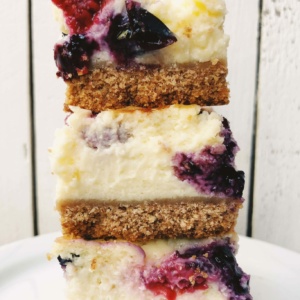 stack of 3 red, white and blueberry cheesecake bars