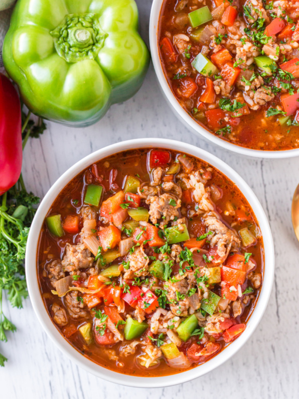 stuffed pepper soup in white bowls