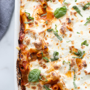 burrata baked ziti in white casserole dish