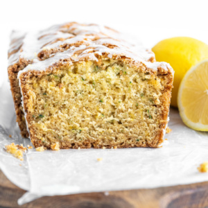 iced lemon zucchini bread cut open to see inside