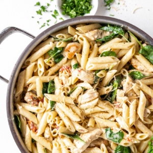 tuscan chicken pasta in a skillet