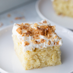 slice of coconut cake on plate