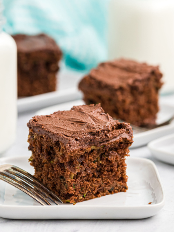 slices of chocolate cake on white plates