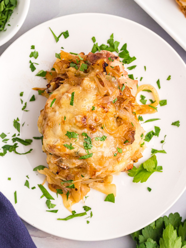 french onion sheet pan chicken on a plate