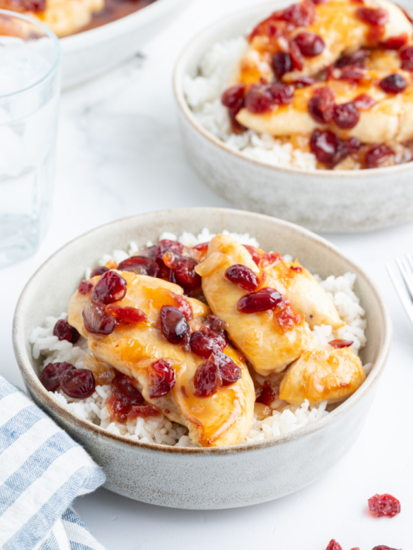 apricot cranberry chicken in a bowl with rice