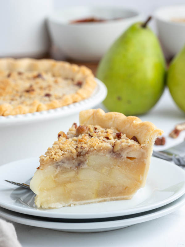 slice of ginger pear pie on a plate