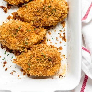 baked cornflake chicken in a baking dish