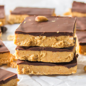 three no bake peanut butter bars stacked