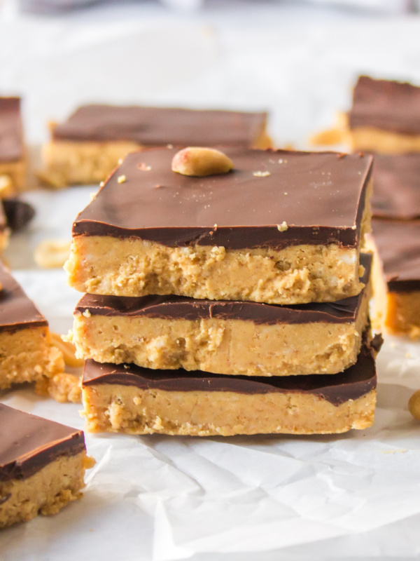 three no bake peanut butter bars stacked