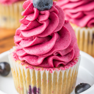 blueberry cupcake piled high with frosting