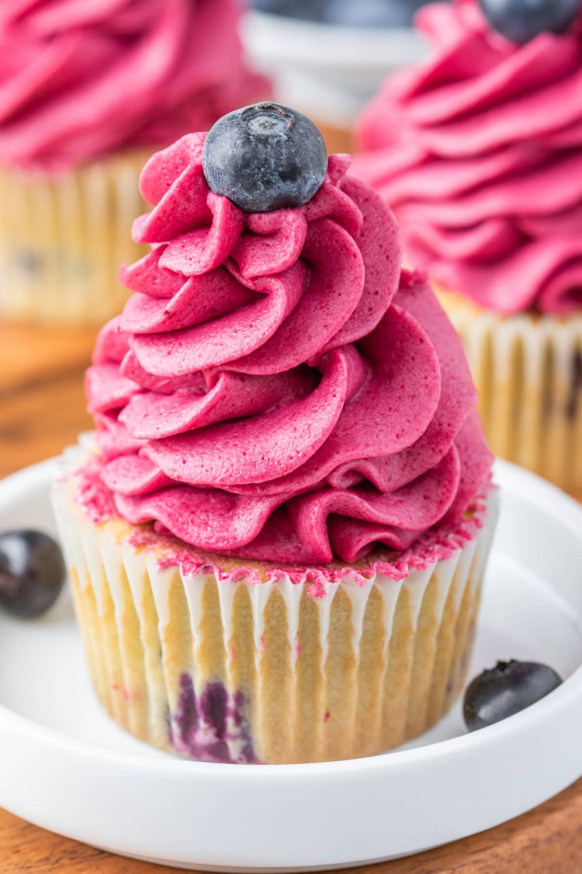 blueberry cupcake piled high with frosting