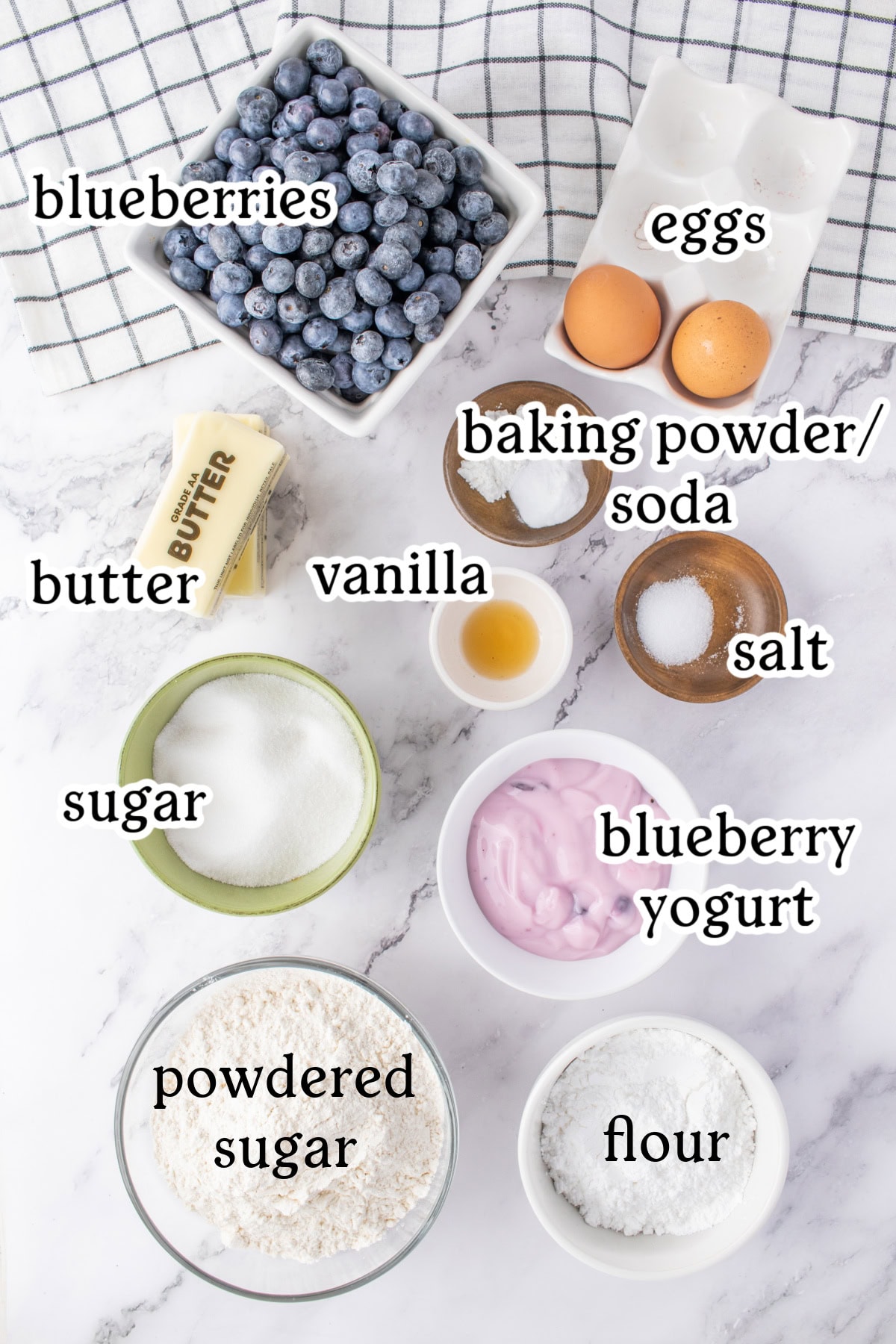 ingredients displayed for making blueberry cupcakes