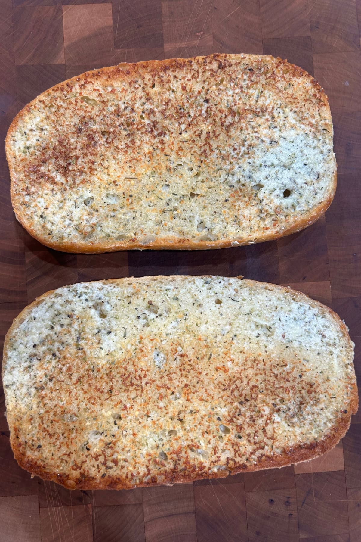 two pieces of garlic bread