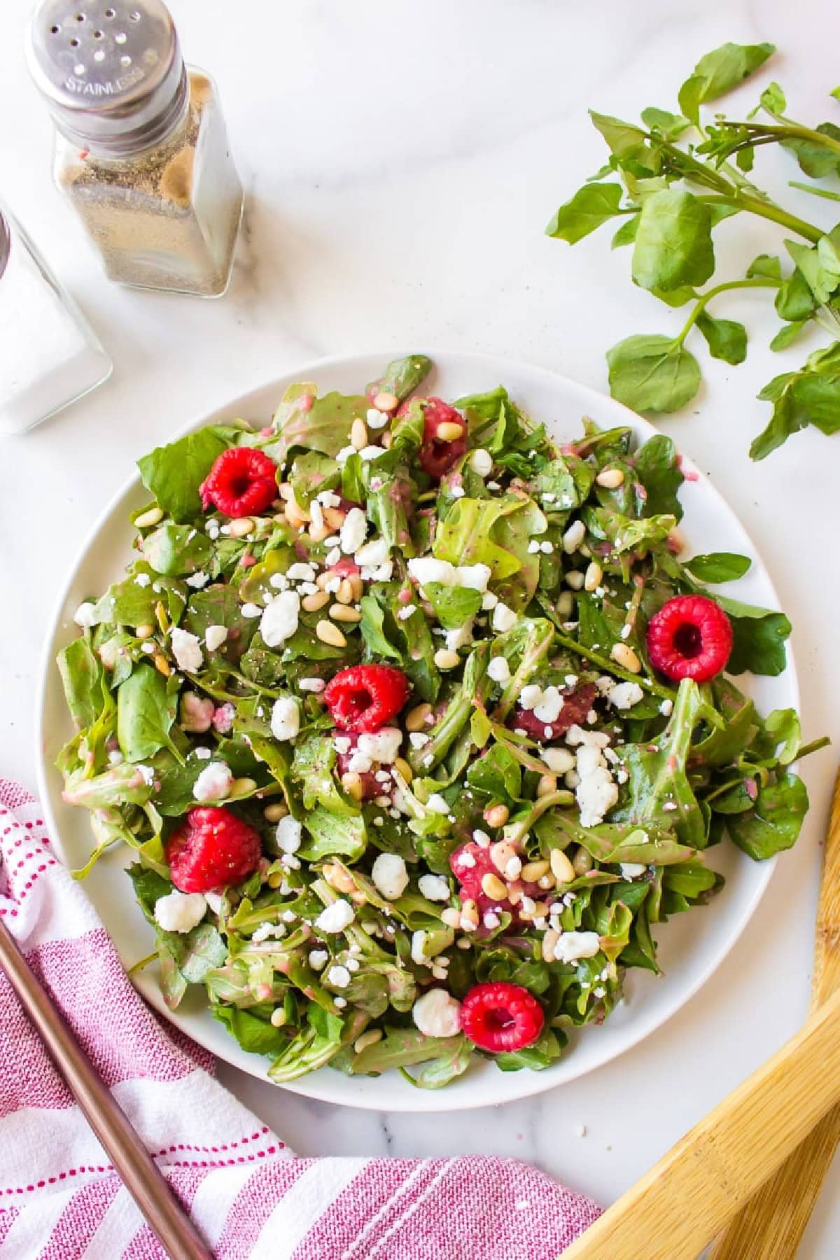 bowl of goat cheese salad with raspberry vinaigrette
