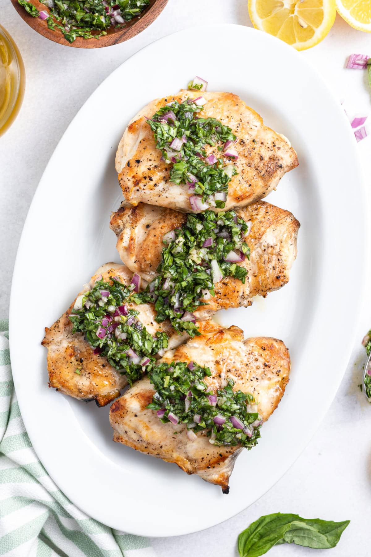 grilled chicken topped with basil chimichurri