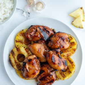 grilled huli huli chicken with pineapple on a plate