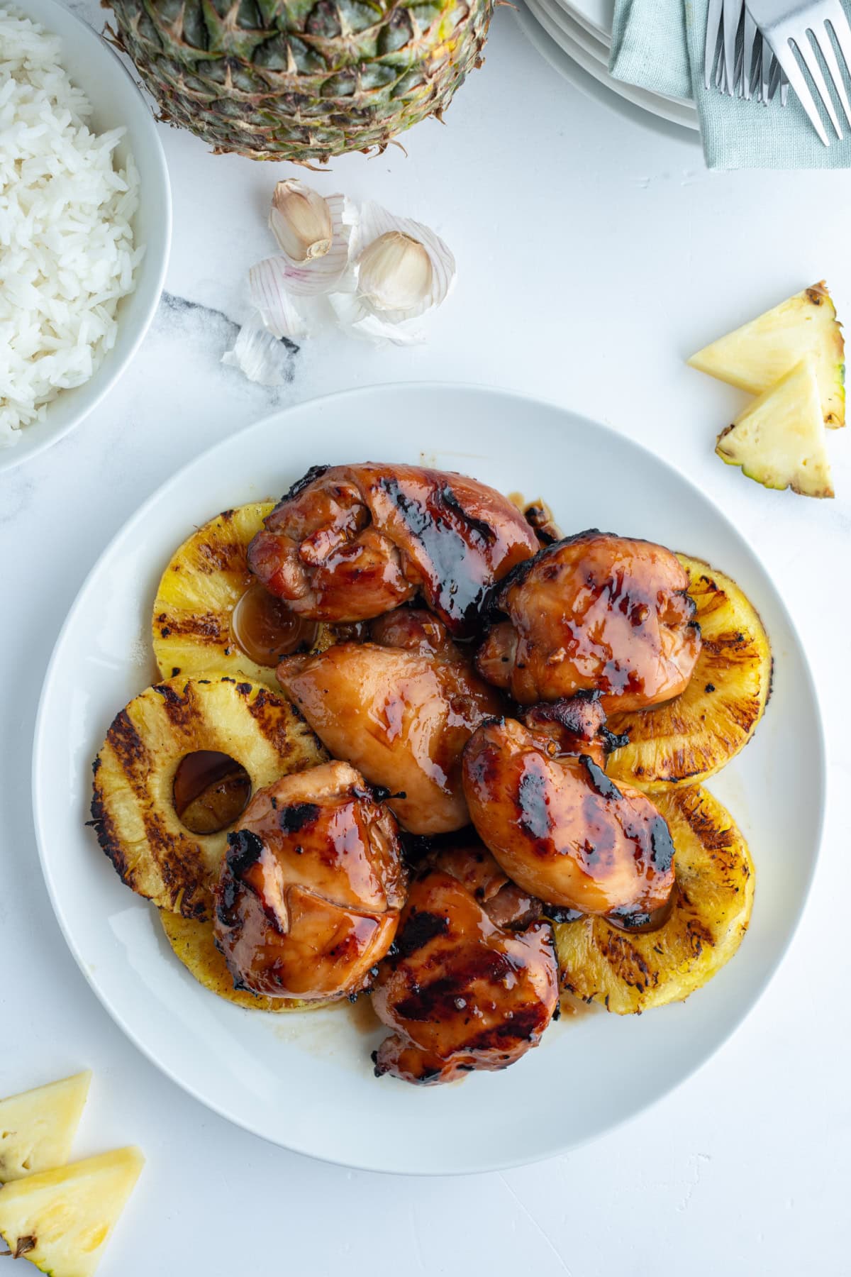 grilled huli huli chicken with pineapple on a plate