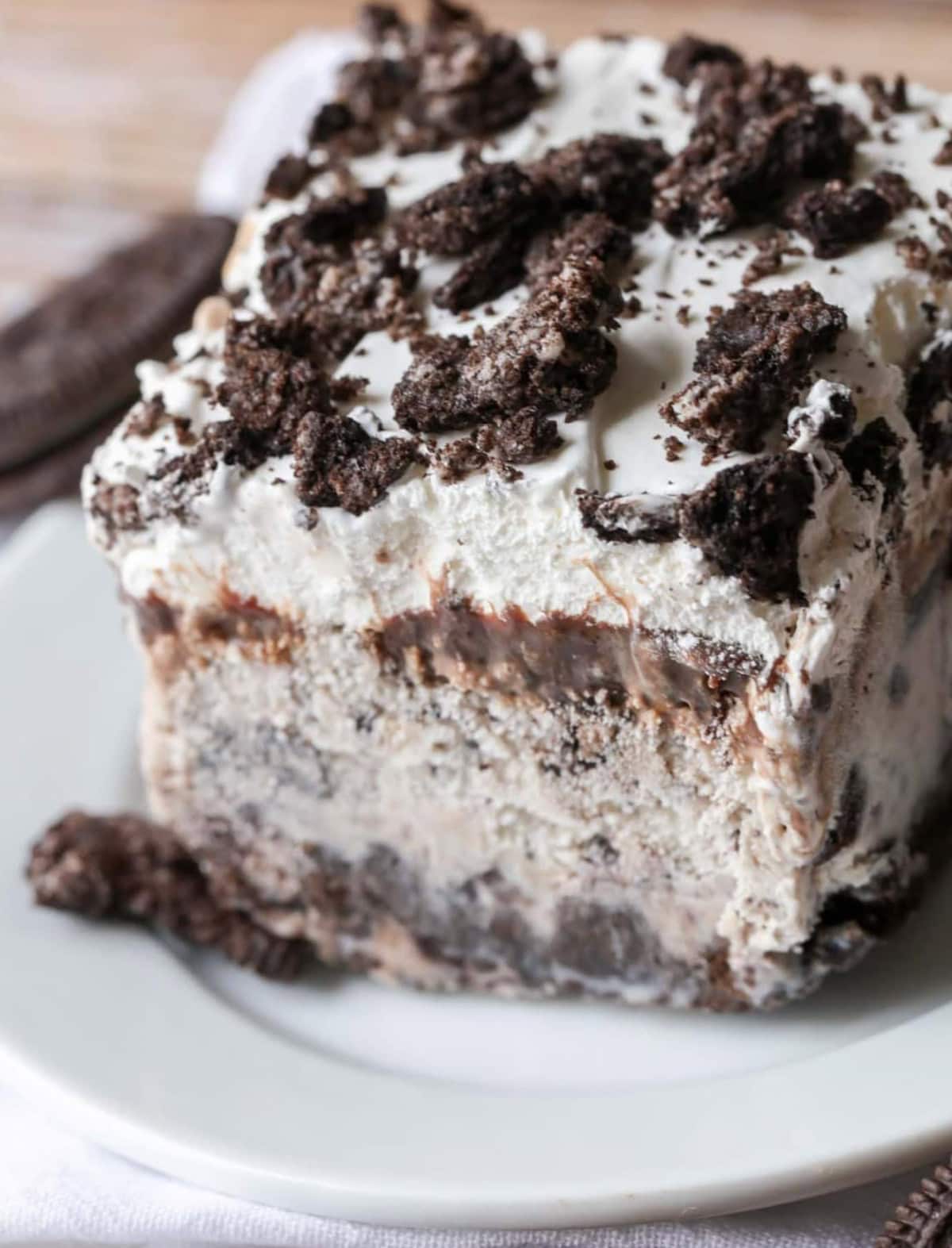 slice of cookies and cream ice cream cake on plate