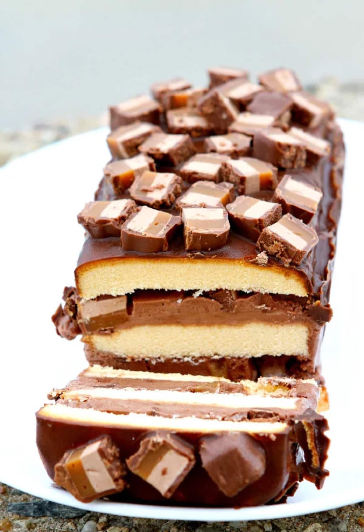 easy candy bar ice cream cake sliced open