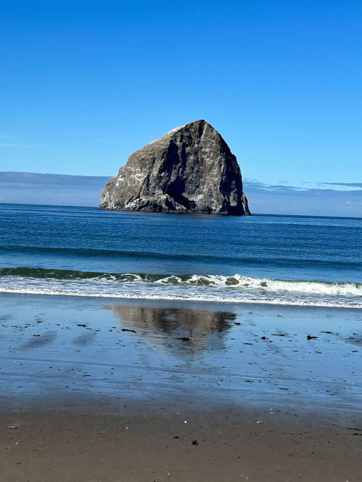 view of rock in Pacific City beach