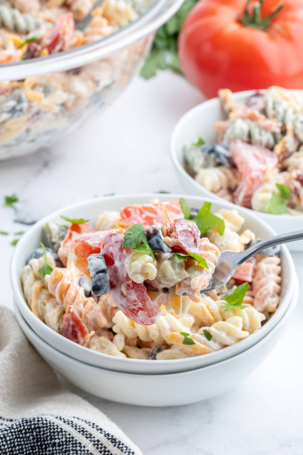 bacon ranch pasta salad in bowl with spoon