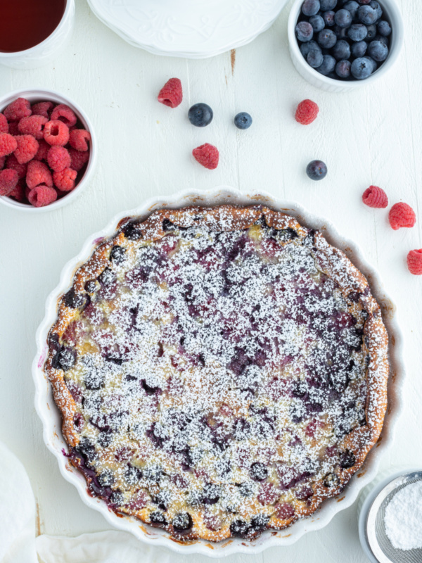 whole berry clafoutis french dessert in white dish