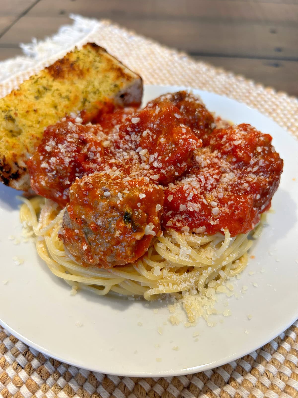 garlic bread meatballs in sauce on pasta