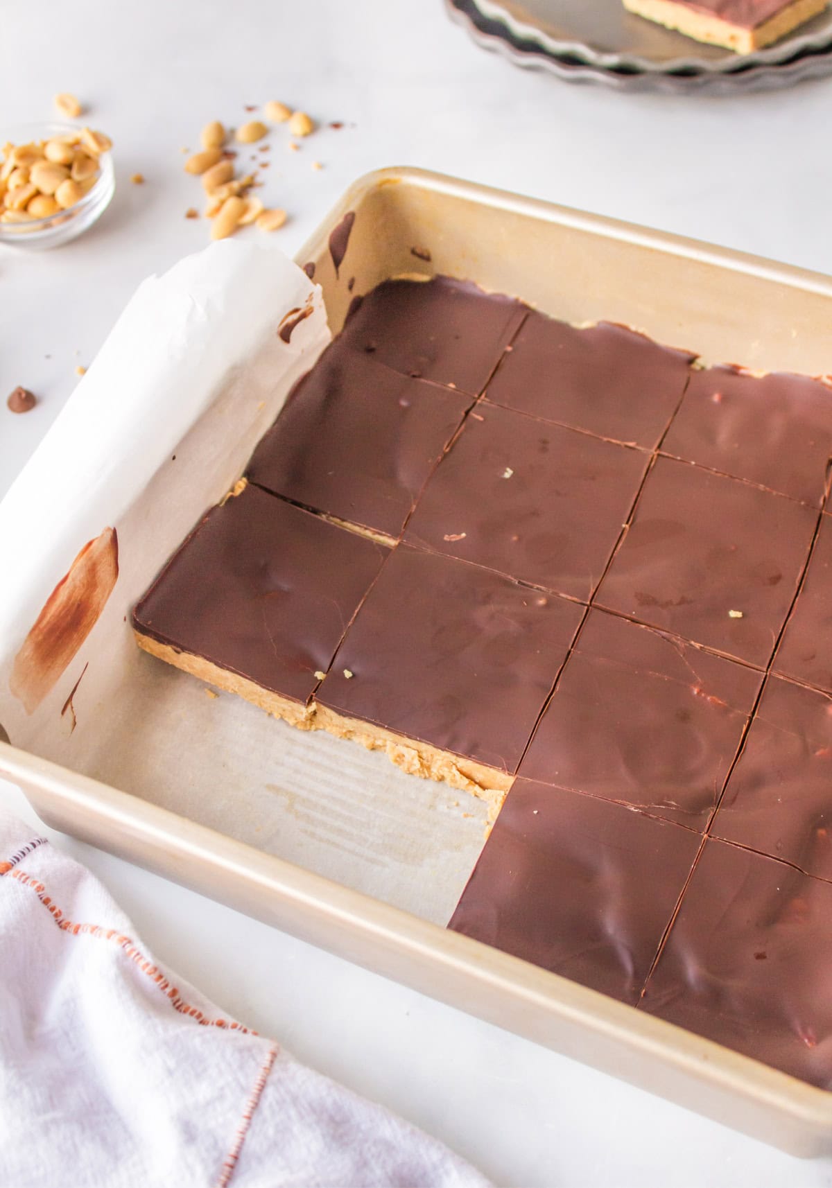 pan of peanut butter bars with a couple of bars cut out