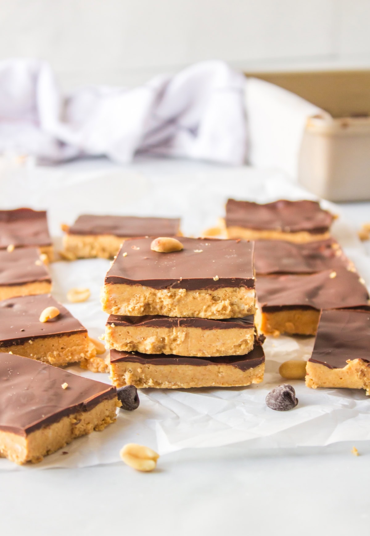 three stacked no bake peanut butter bars