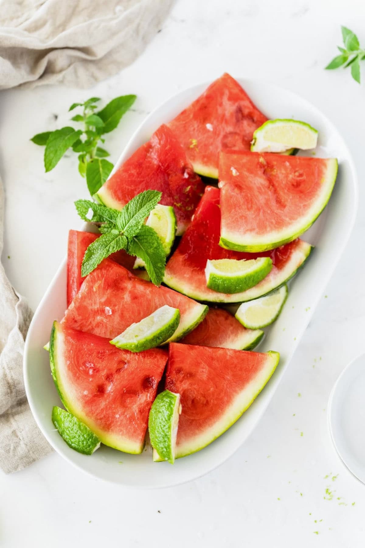 platter of tequila soaked watermelon wedges