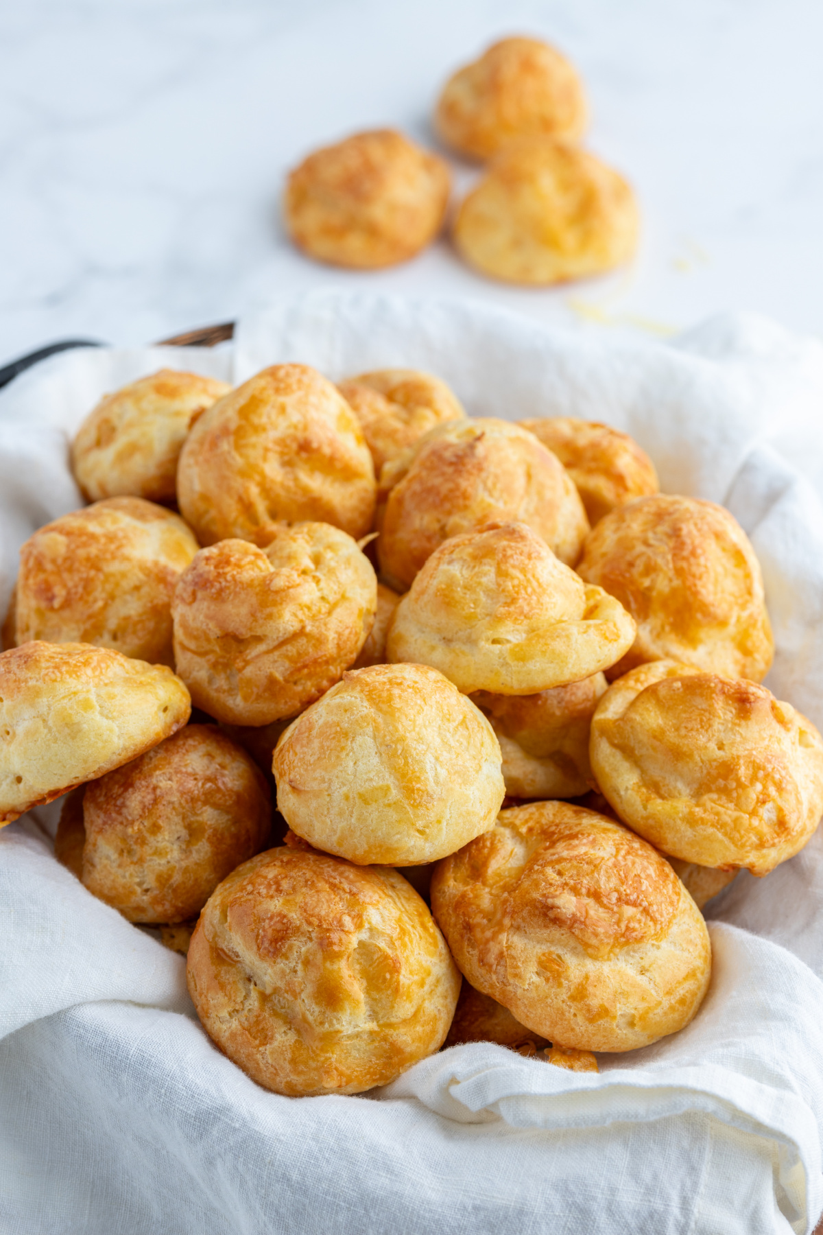 gougeres in cloth lined basket