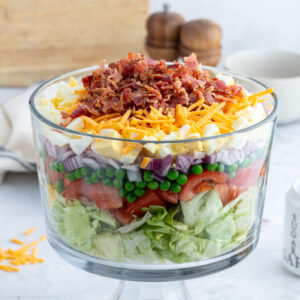 7 layer salad in trifle bowl