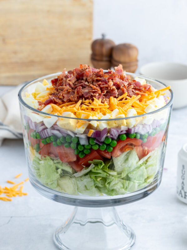 7 layer salad in trifle bowl