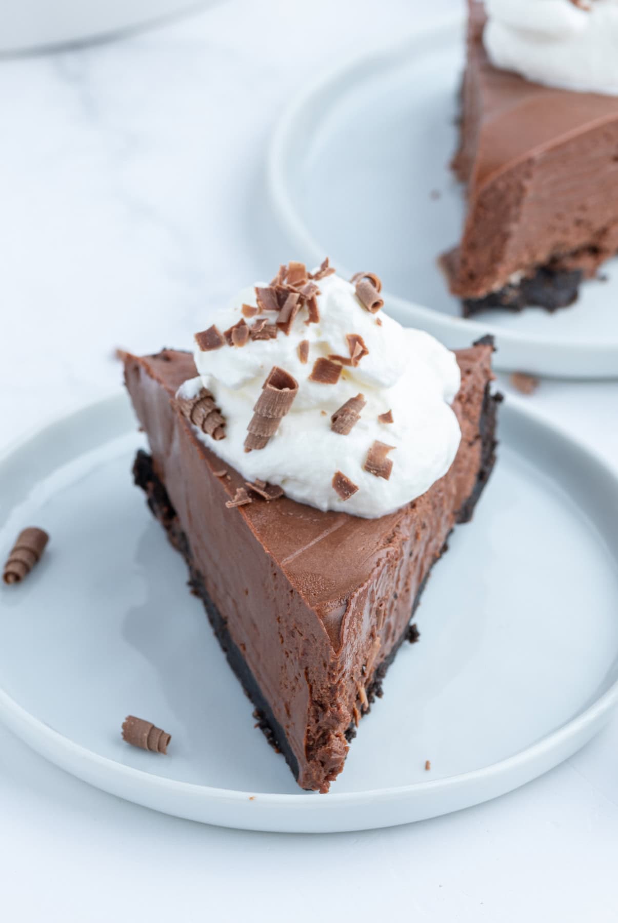 slice of easy chocolate truffle pie with whipped cream on top