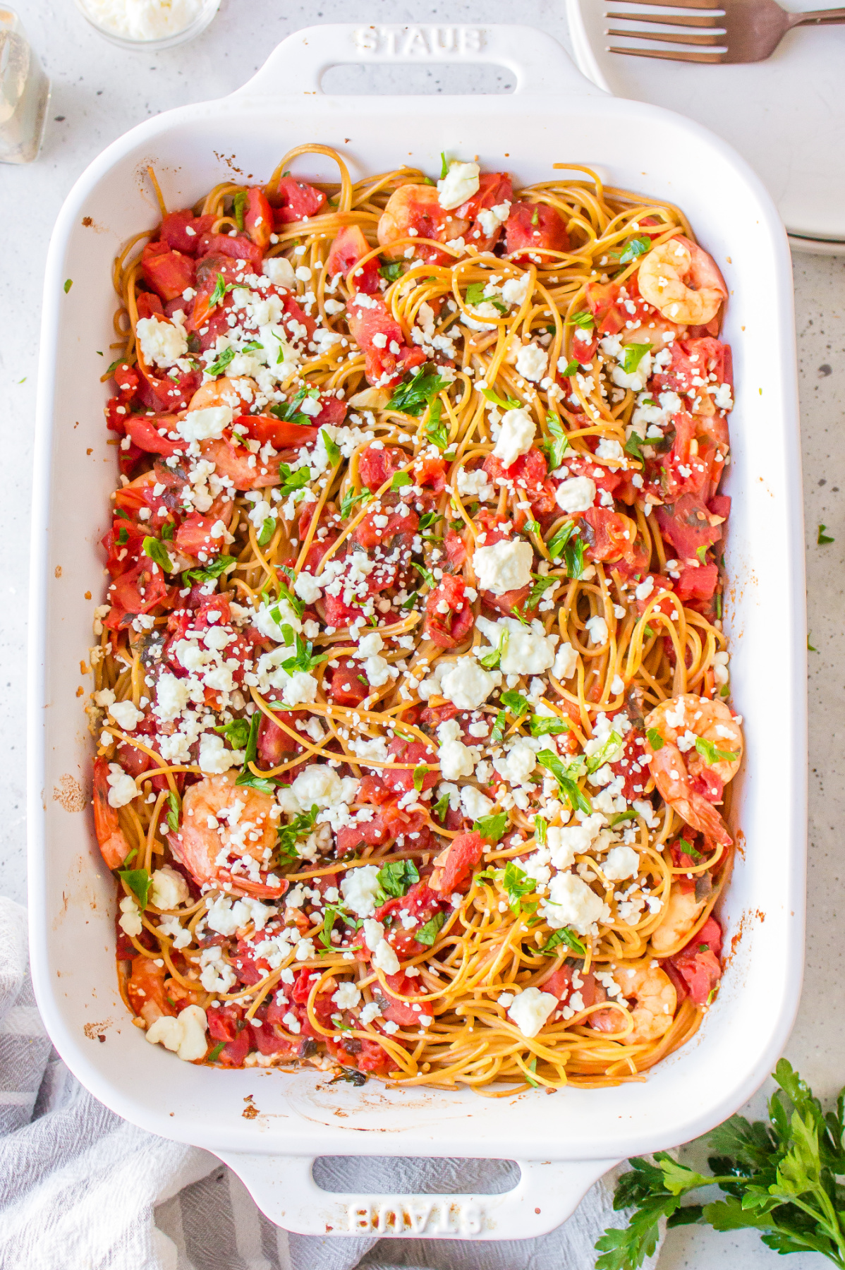 greek shrimp pasta in baking dish