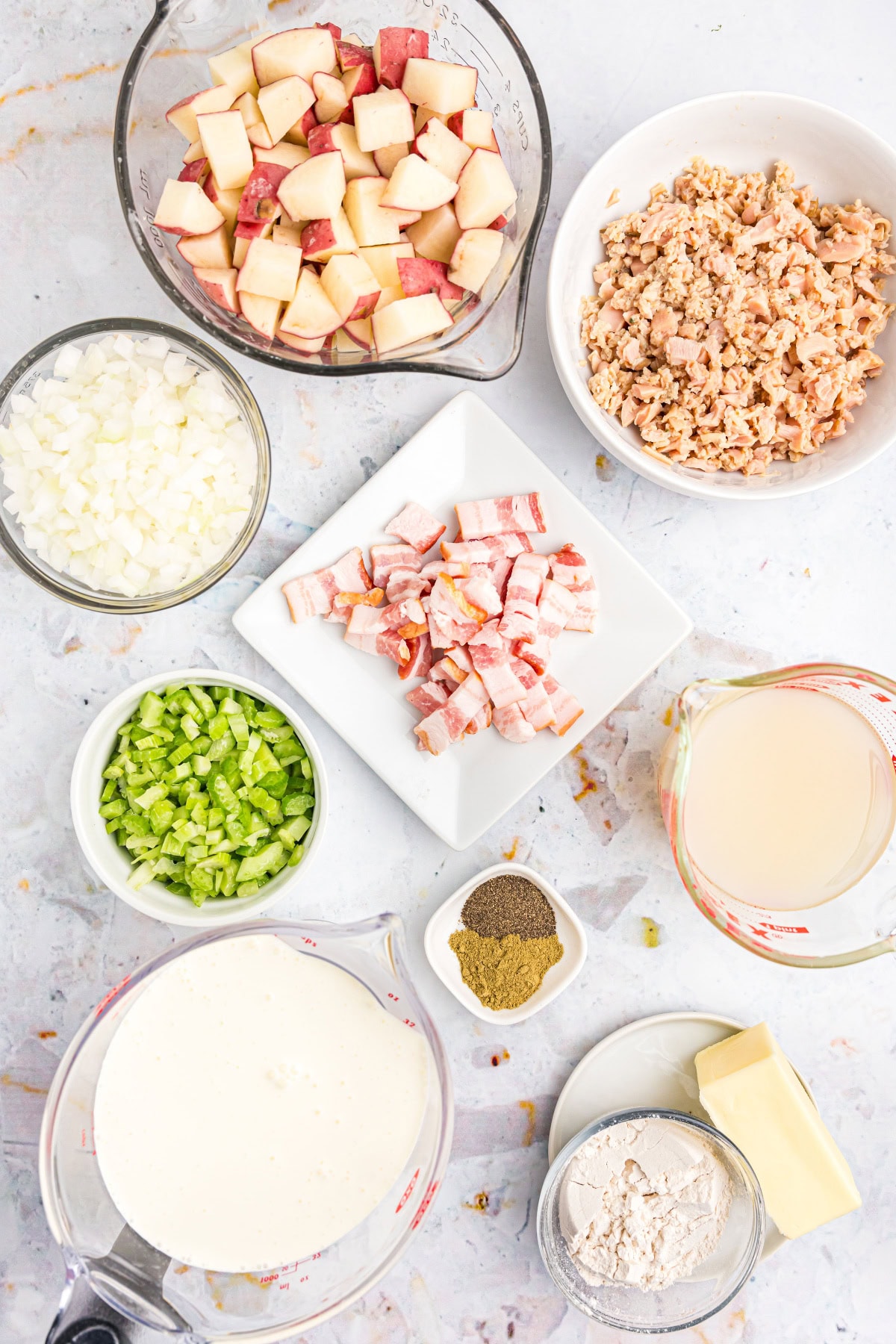 ingredients displayed for making new england clam chowder