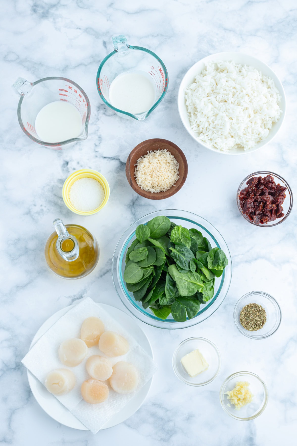 ingredients displayed for making scallops with cream sauce