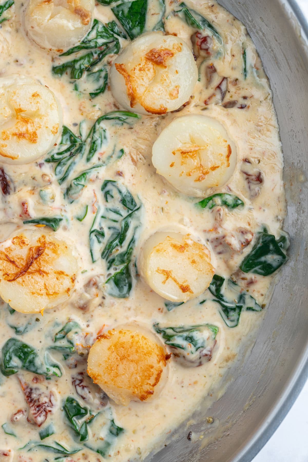 overhead shot of scallops in pan