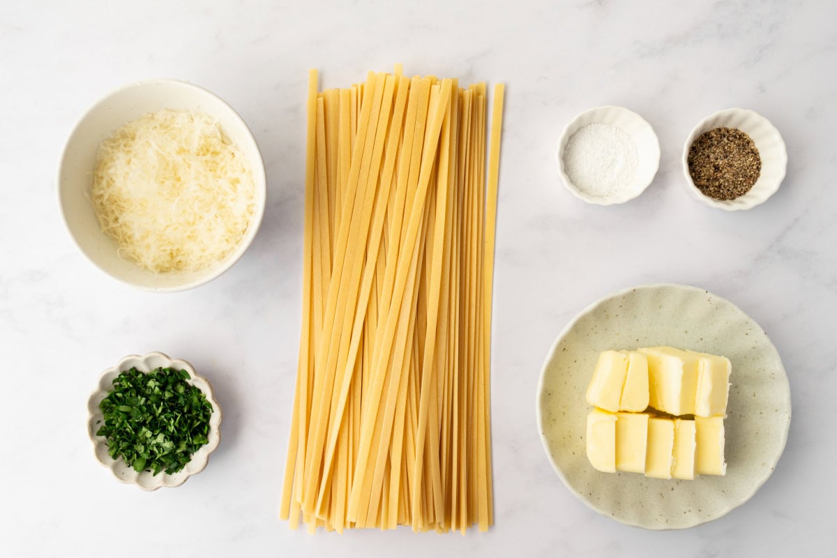 ingredients displayed for making authentic alfredo sauce