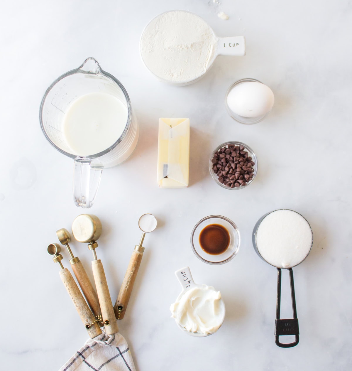 ingredients displayed for making chocolate chip muffins